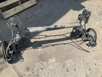 14-18 Ford Transit Connect Rear Axle Beam W/ Hub P. Fixed Price $179.99.