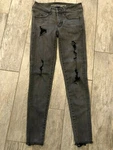 American Eagle Super Stretch Jegging Jeans Destroyed Holes 2R Grunge. Fixed Price $13.66.